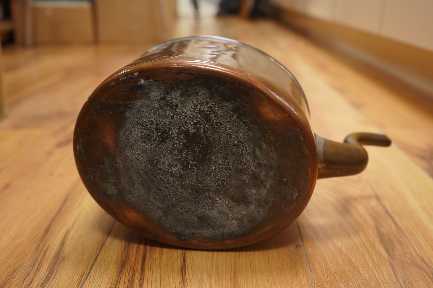 Two Benham & Froud copper saucepans and a copper kettle, largest 43cm in length